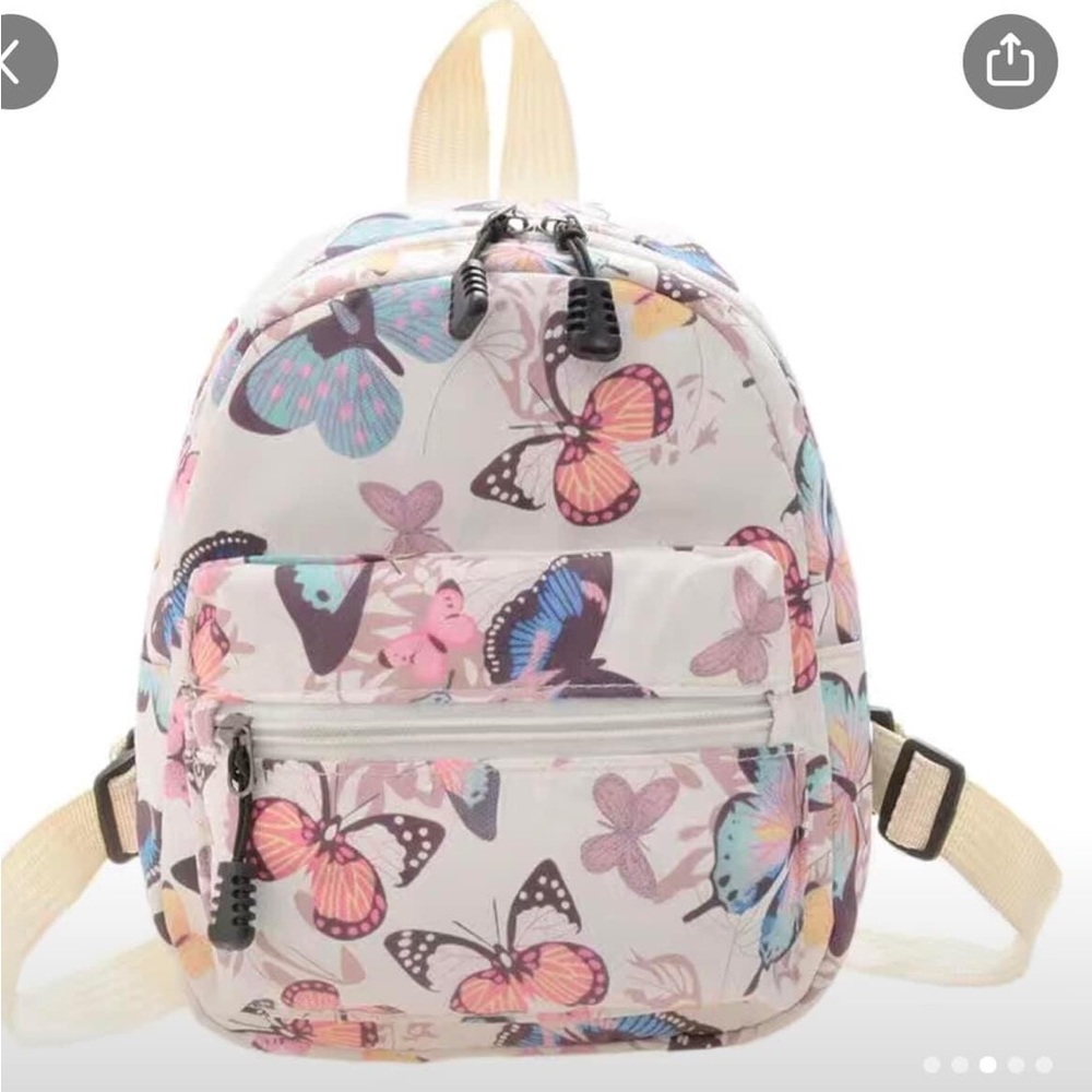 2 very cute back packs. Size is on the black and white one